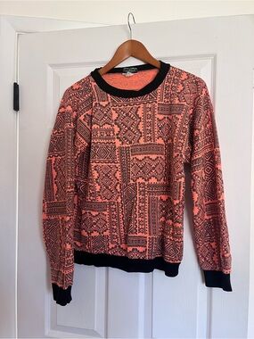 Sky Lite • Orange & Black Patterned Crewneck Sweater